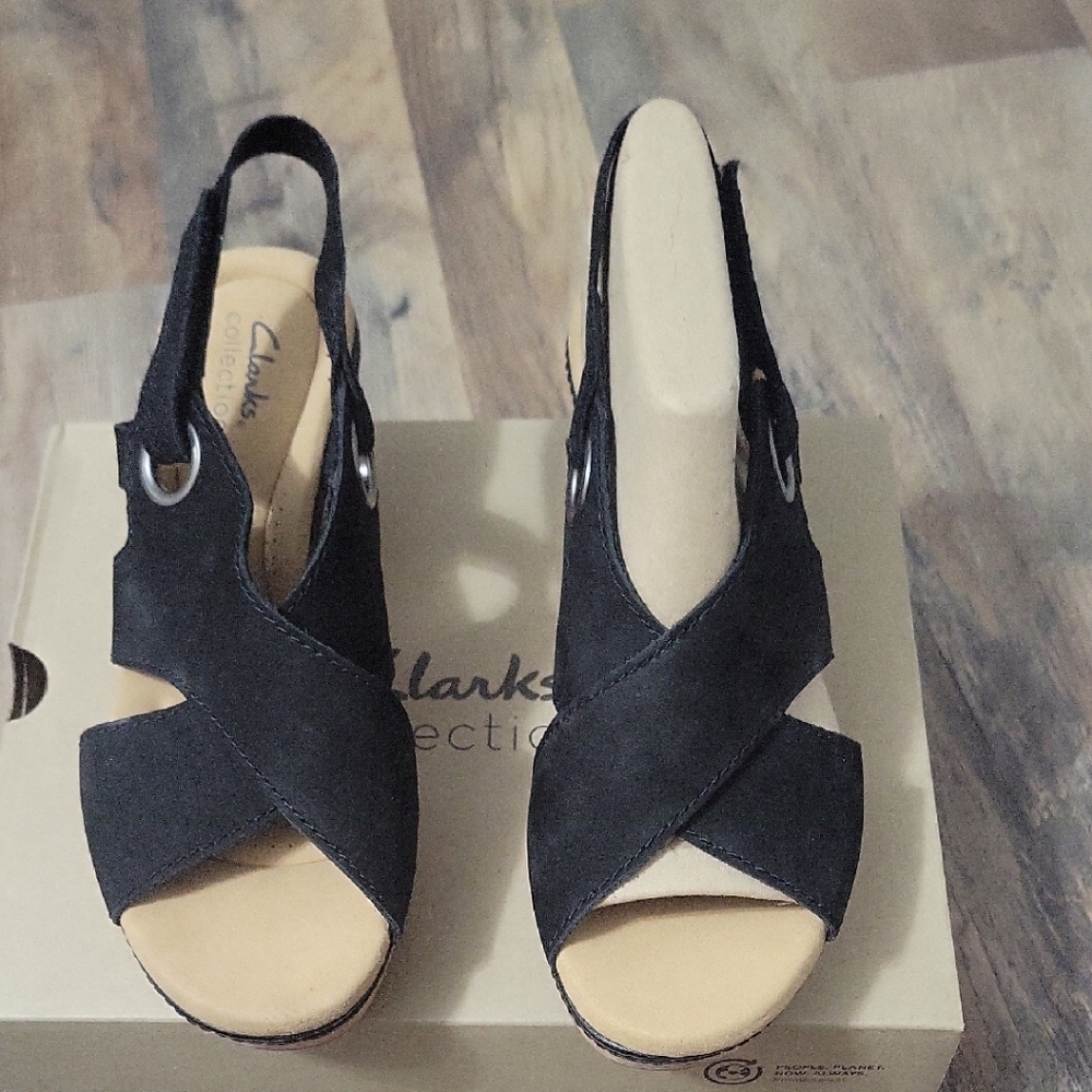 Clarks Black and Cream Sandals with Crisscross Straps